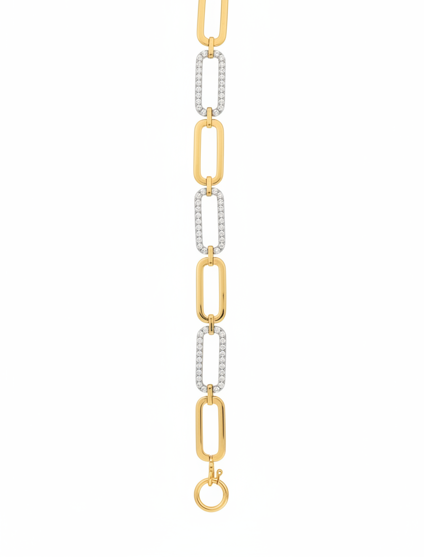 A gold chain necklace with elongated rectangular links, some inlaid with small clear stones.