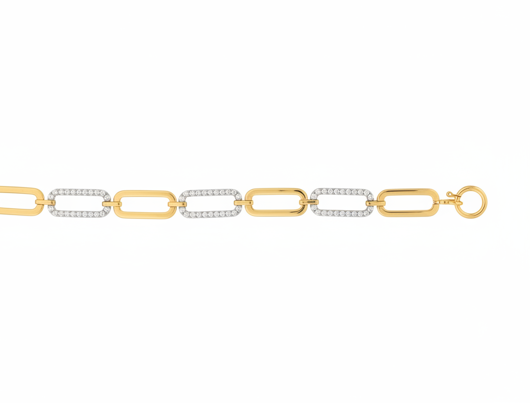 A gold chain necklace with elongated rectangular links, some inlaid with small clear stones.